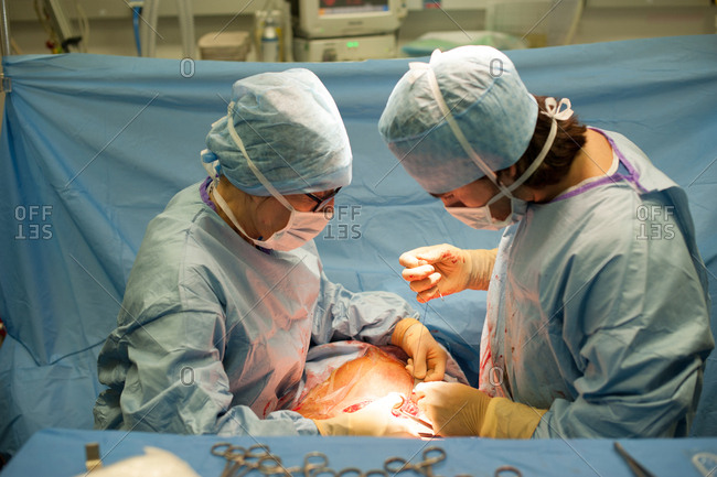 October 10, 2013: Reportage in the maternity department of Santa Maria Clinic in Nice, France.
Cesarean birth. Stitches.