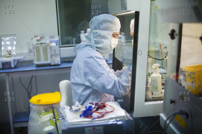 November 18, 2014: Reportage in a Swiss biobank which specializes in storing stem cells from blood in the umbilical cord (hematopoietic stem cells) and stem cells from tissue from the umbilical cord (mesenchymal stem cells). Adding cryoprotectant to the cryogenic bag containing the isolated stem cells.