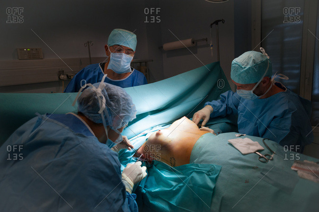 November 4, 2014: Report to the clinic of aesthetic surgery Mozart, Nice, France. Placement of breast prostheses, axillary, in a patient without a mammary gland, the surgeon photographs his chest before the operation