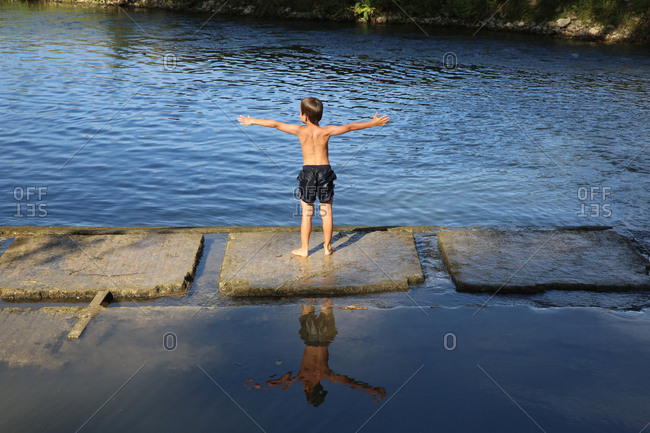 Boy Playing Riverside