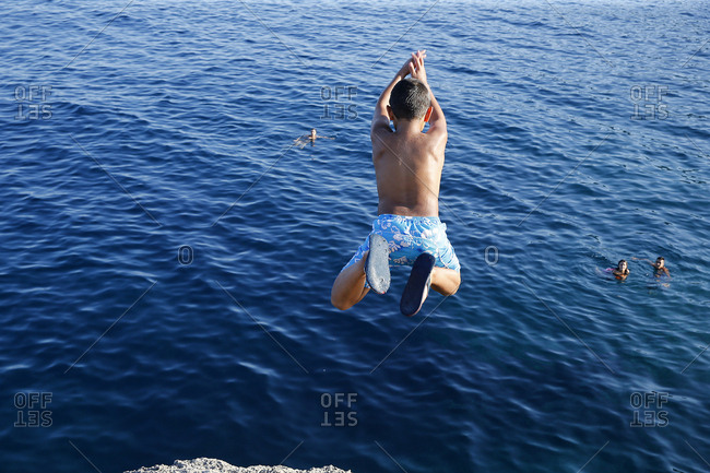 9-Year-Old Boy Diving Into the Sea