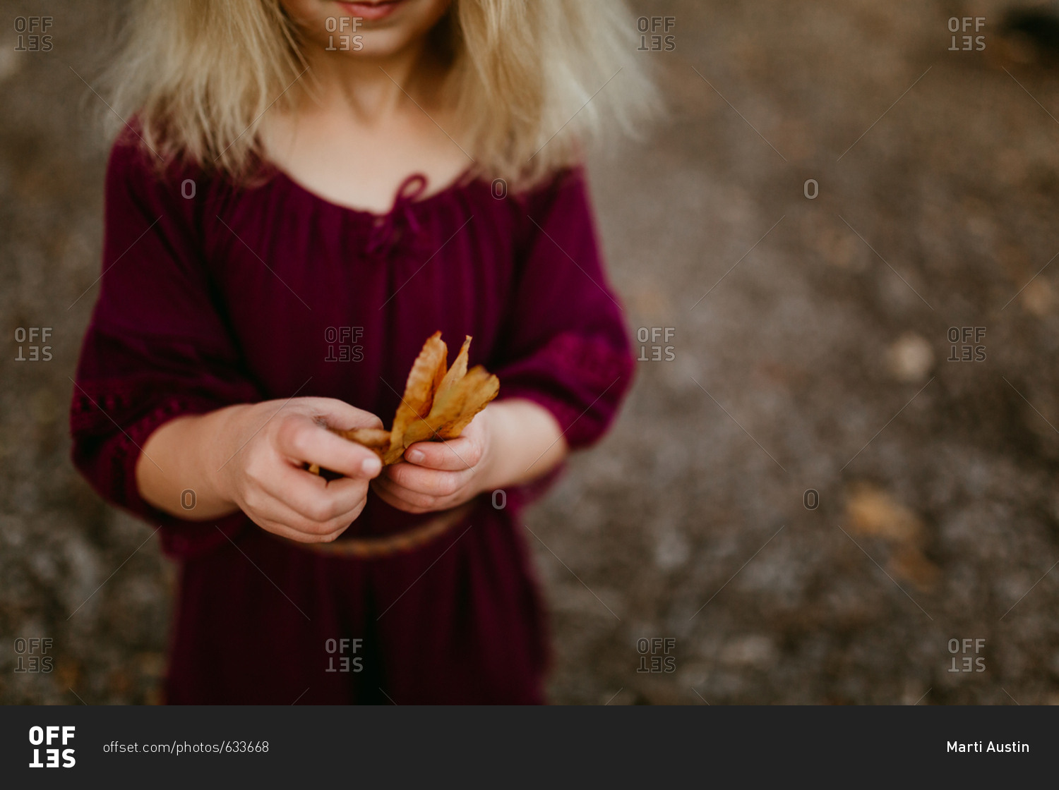 Girl holding a leaf
