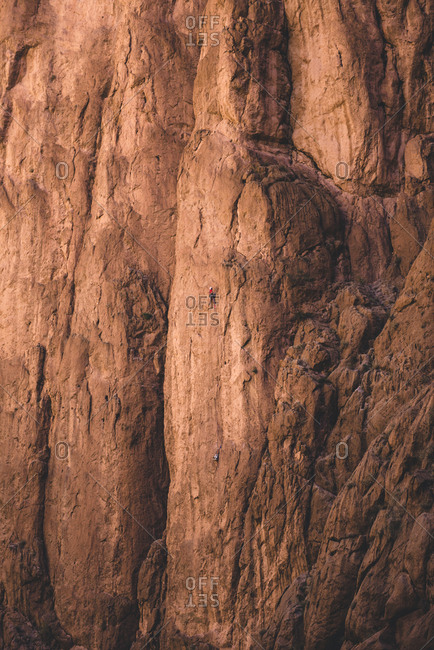 Rock climber at Tondra Gorge, Morocco