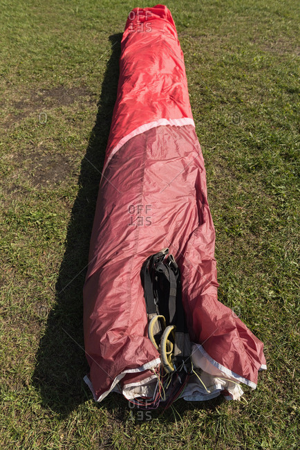 Parachute lying on landscape on a sunny day