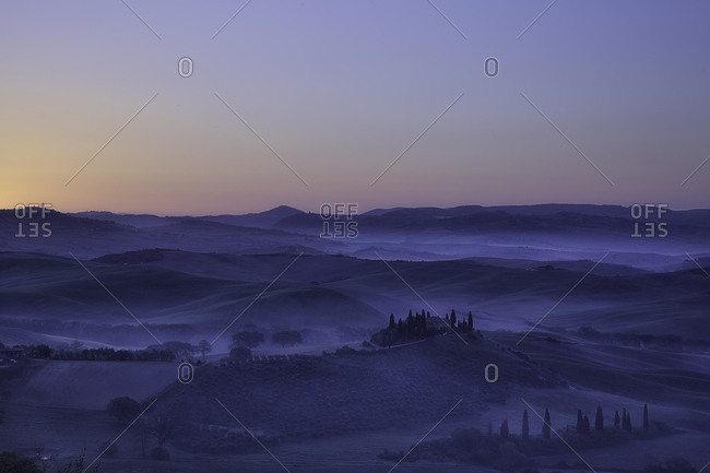 Val d'Orcia, Orcia valley, Tuscany, Italy - April 24, 2017: Foggy dawn
