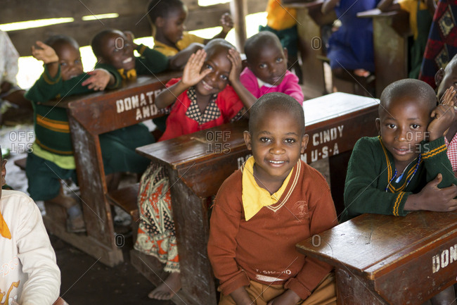 Children sitting at desks in school