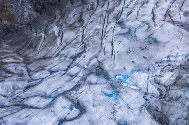Aerial image of tourists waiting to board tourism helicopters near Juneau's Mendenhall Glacier