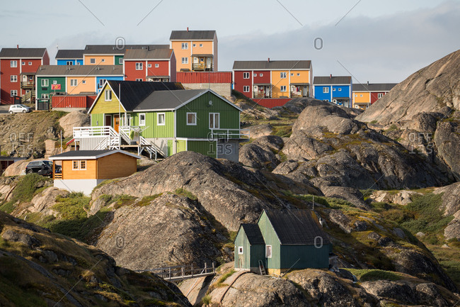 Colorful Scandinavian Architecture of Sisimiut, Greenland, built on rock and tundra terrain.