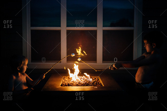 Boys roasting marshmallows