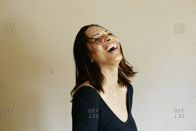 Close up of laughing mixed race woman