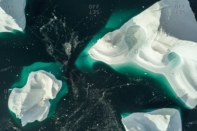 Aerial view of icebergs in Greenland in the Scoresby Sound