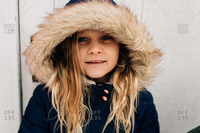 Portrait of little girl with furry hood