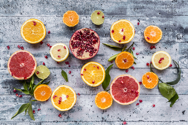Various citrus fruits- orange- tangerine- grapefruit- lime- lemon and pomegranate