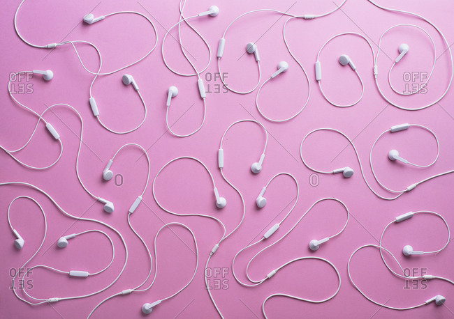 White earphones on pink background- 3D Rendering