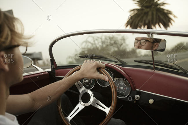 Man Driving Convertible During Road trip