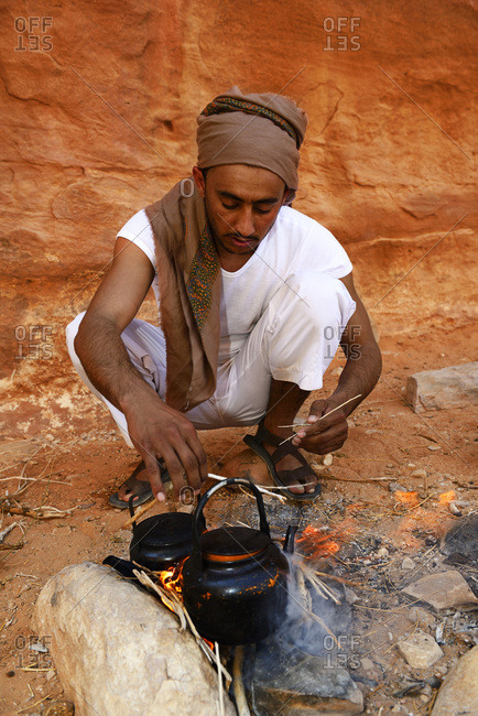 Bedouin cooking Tea in camp-fire, Wadi Rum, Jordan, Asia