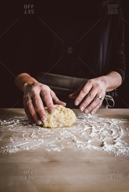 Person making pasta dough - Offset