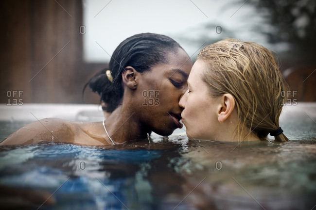 Lesbians Making Out In Pool