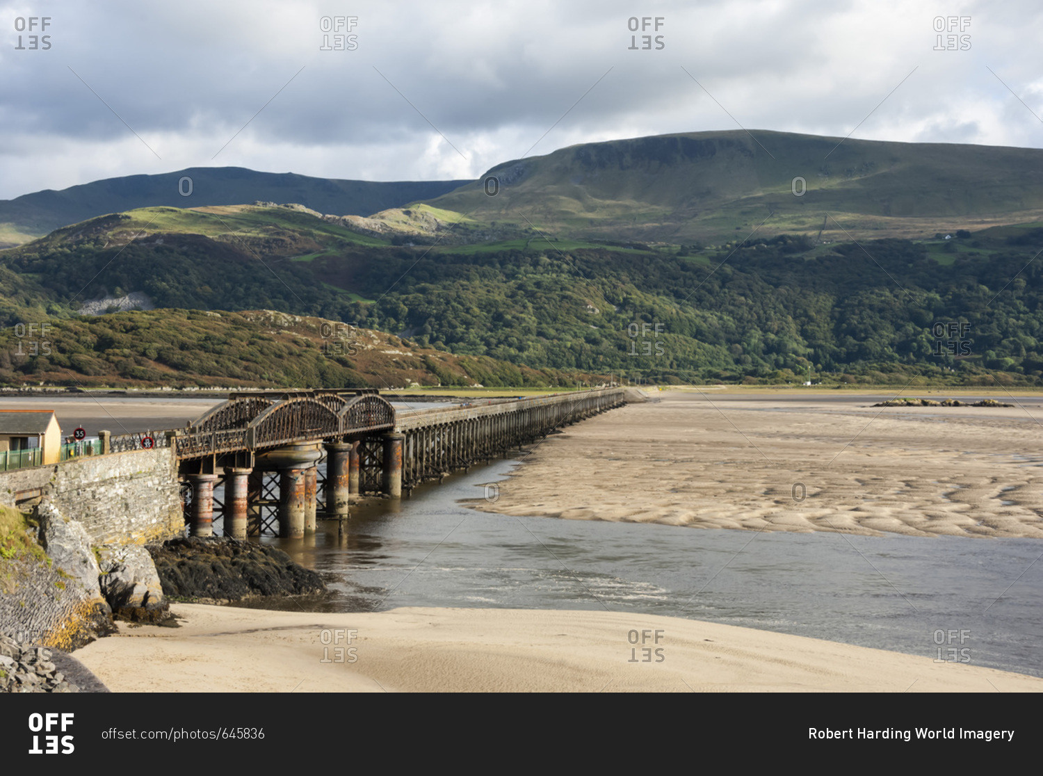 Barmouth Bridge (Viaduct), largely wooden construction, on Cambrian Coast Railway across River Mawddach, Cardigan Bay, Gwynedd, Wales, United Kingdom, Europe