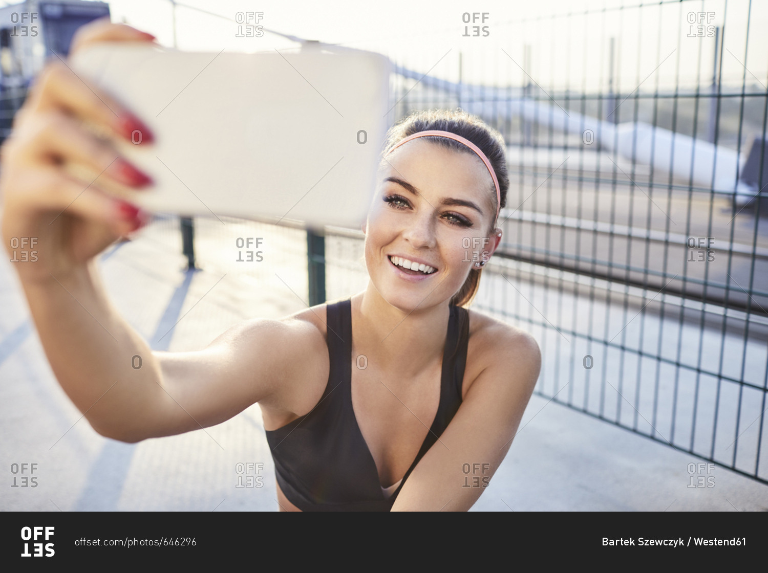Fit woman taking selfie after outdoor workout