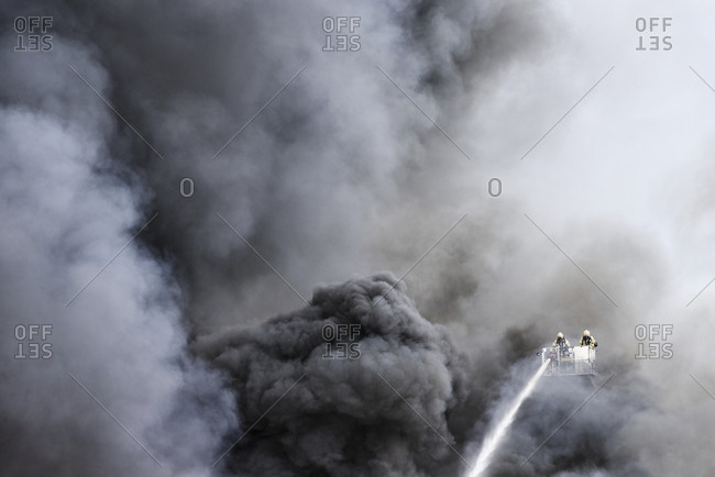 Firefighters fighting fire