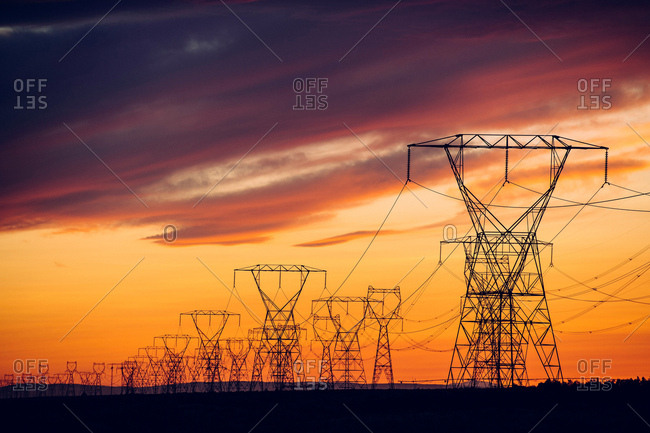 Electricity pylons at sunset, Enterprise, Oregon, United States, North America