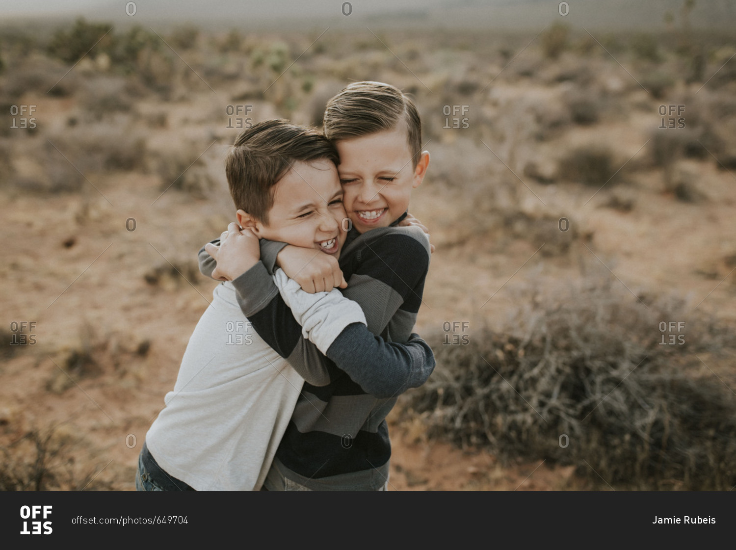 two guys hugging