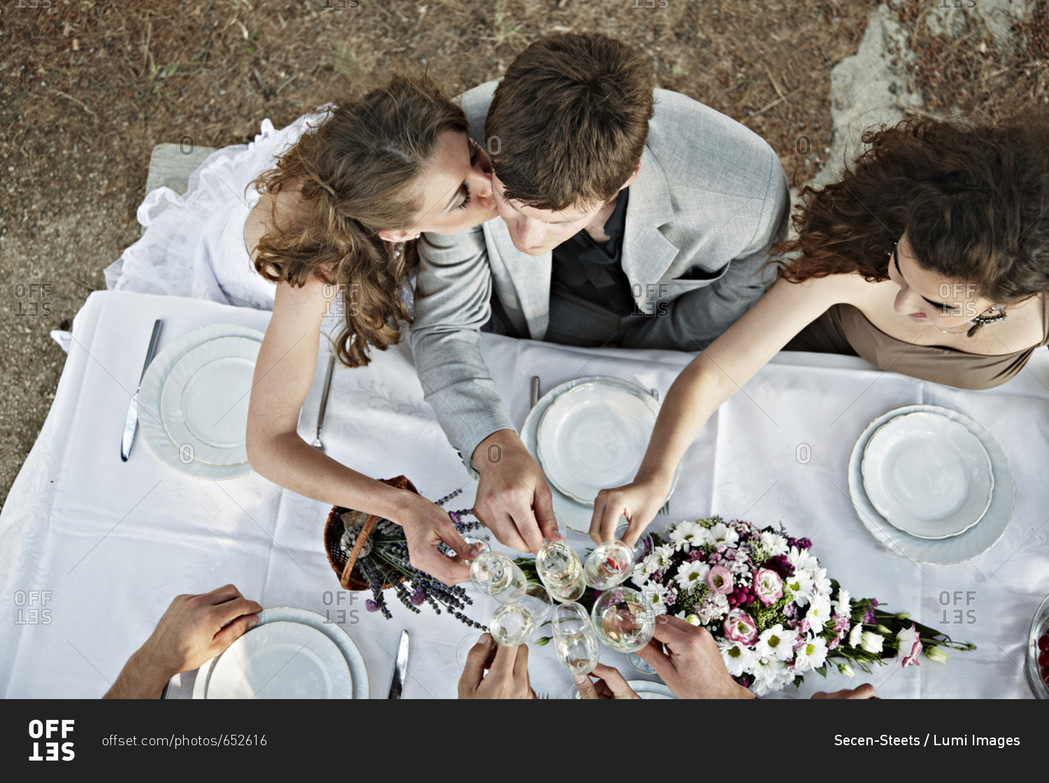 Wedding Couple On Wedding Table Outdoors, Croatia, Europe