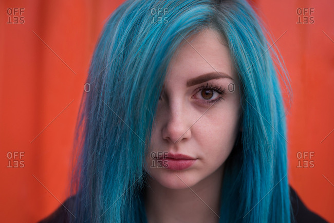 Portrait Of Stylish Woman With Blue Dyed Hair Stock Photo