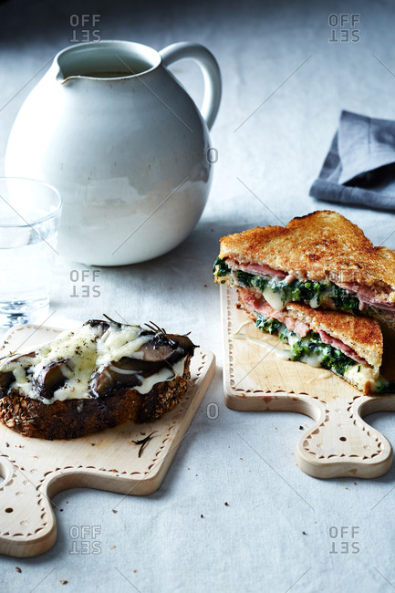 Grilled ham and broccoli rabe sandwich and a roasted Portobello melt