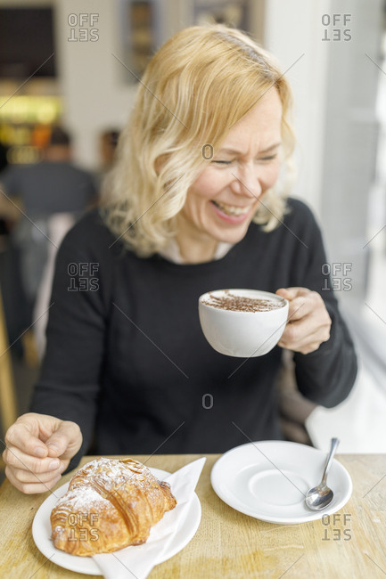 Woman at cafe in England