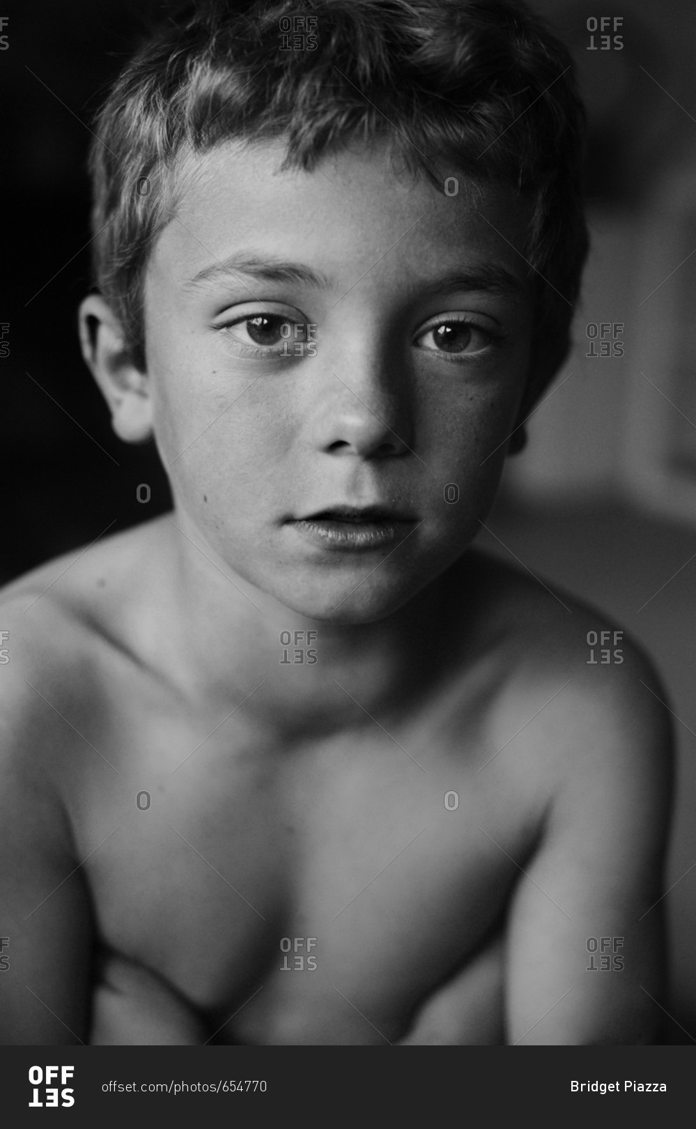 Black and white portrait of a boy stock photo - OFFSET