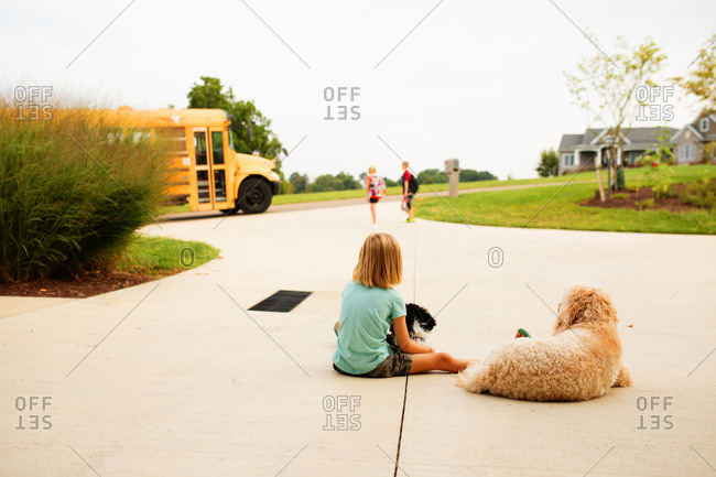 Children getting on bus
