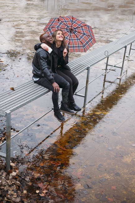 Friends who play in the street with rain Interracial relationships