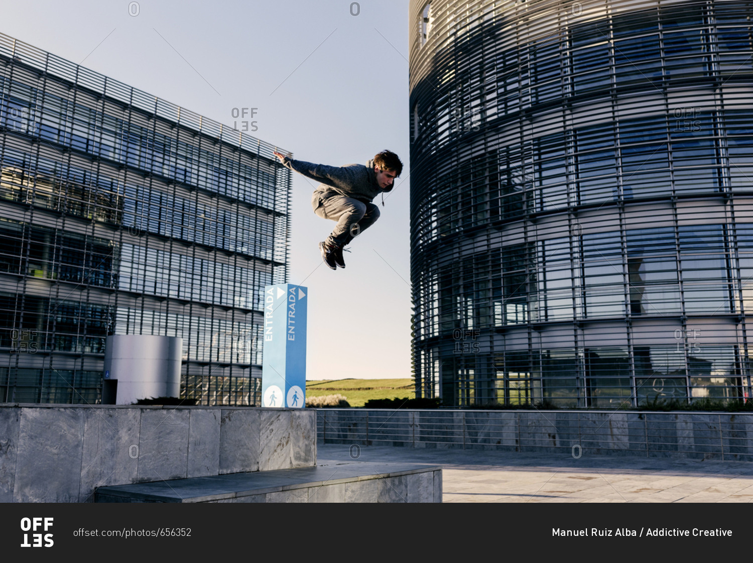 Man performing parkour in city
