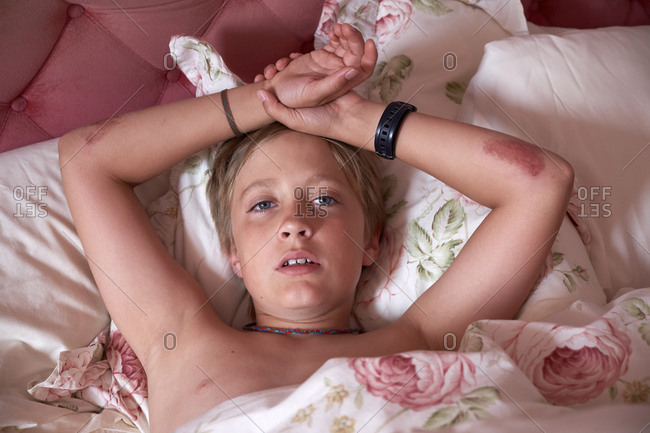 Boy lying in bed