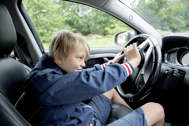 Boy in car