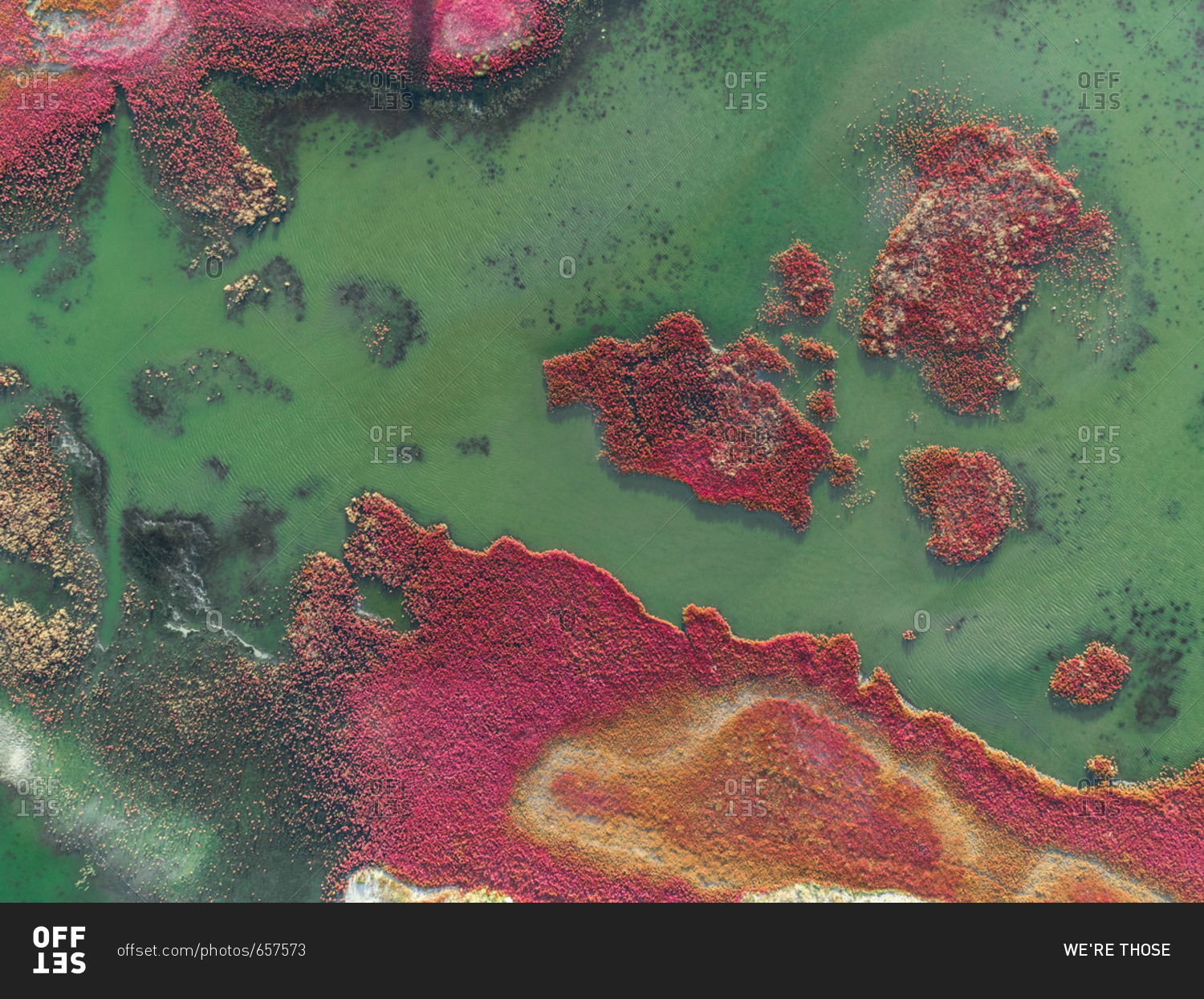 Aerial photography of the colorful Prokopou Lagoon in Greece.