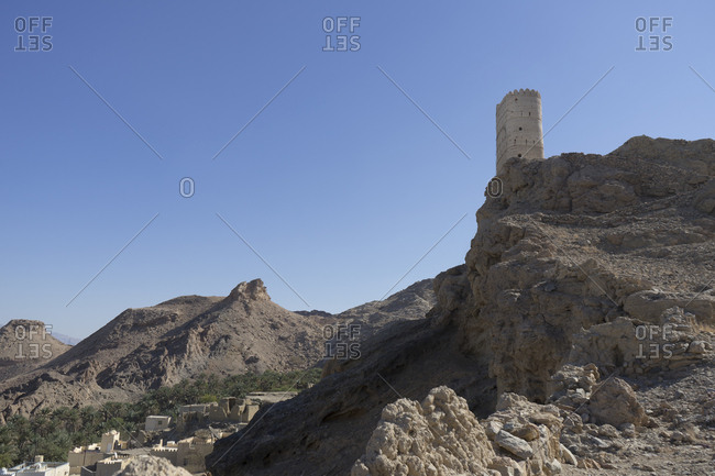 Dramatically situated old watchtower atop a hill south of Muscat, Oman