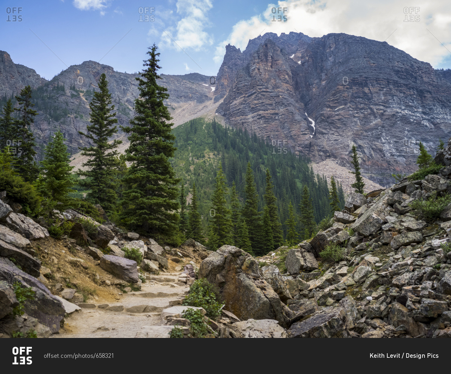 A trail leading through a rocky terrain in the Canadian Rocky Mountains, Banff National Park 