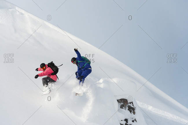 Snowboarding In Powder Snow; St. Moritz, Graubunden, Switzerland