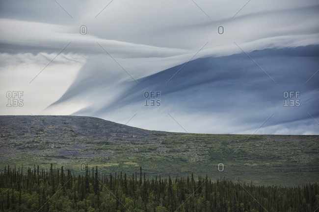 Lenticular Clouds Form Over The Flanks Of Crow Mountain; Old Crow, Yukon, Canada