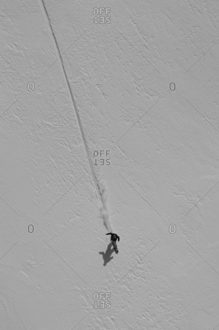 Person Extreme Snowboarding In Mountains Of New Zealand