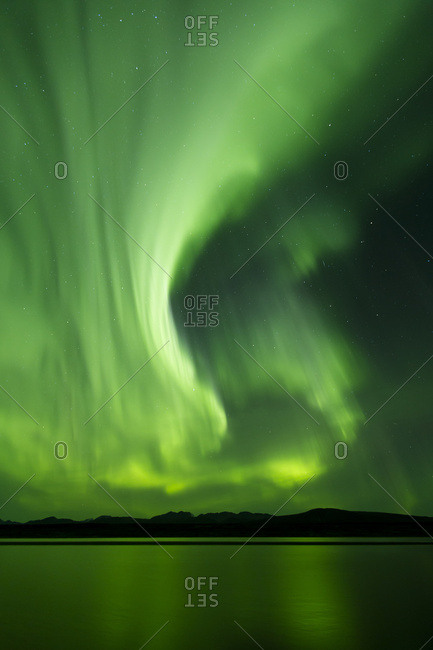 Aurora Borealis (Northern Lights) Reflected In 50 Mile Lake Along The Denali Highway, South-central Alaska; Alaska, United States Of America