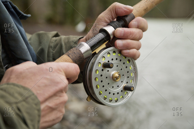 A Fisherman Fishing In The Chilliwack River With A Centerpin Reel; Chilliwack, British Columbia, Canada