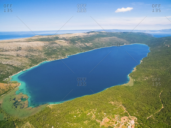 Lake Vrana on Cres Island shot from drone at 700m in altitude. A fresh water lake which is below sea level.