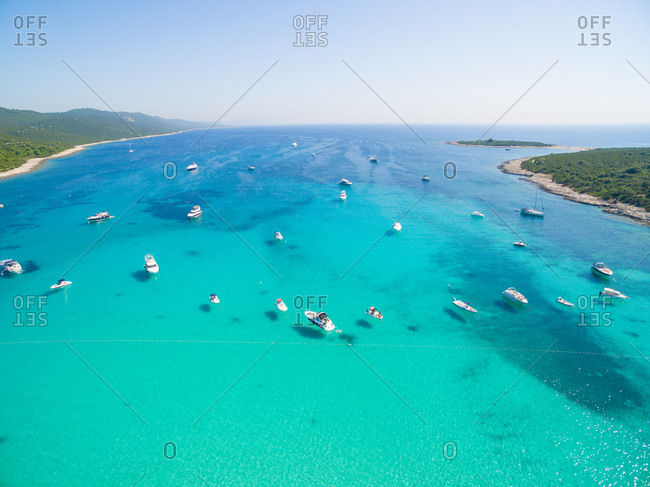 Aerial view of sailing boats and yachts in the bay of Sakarun on the island of Dugi Otok in Croatia