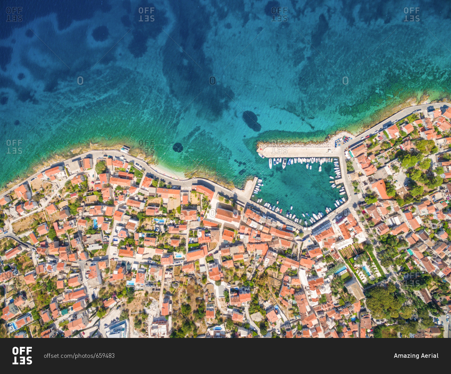 Aerial view of small harbor with moored boats in the Adriatic stock ...