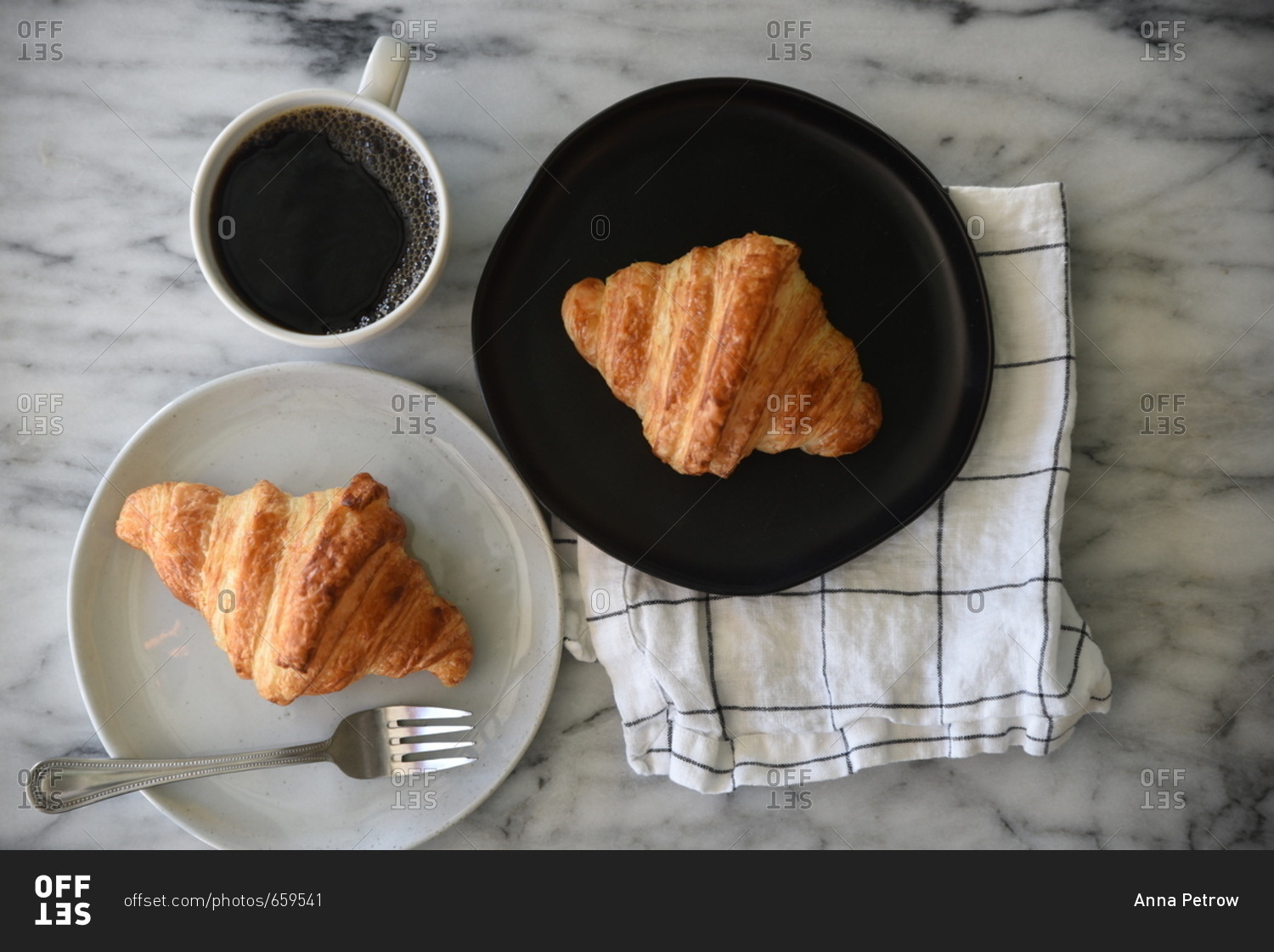 Overhead view of croissants and coffee