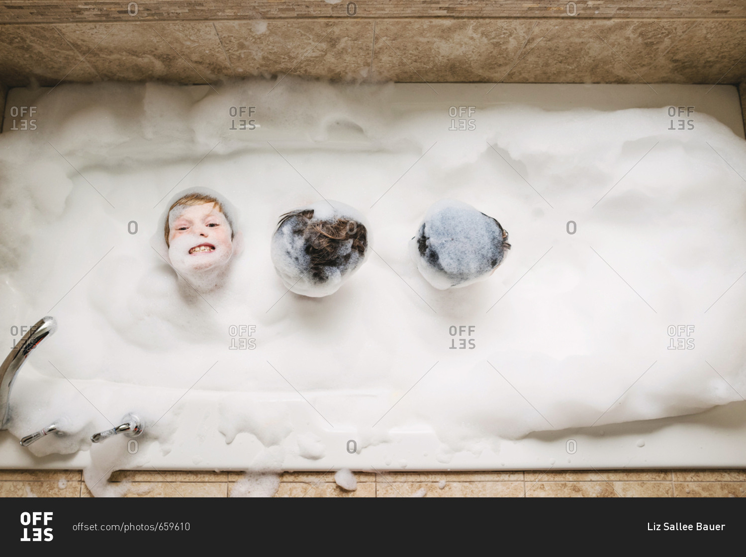 Child Bubble Bath. Pretty Smiling Little Boy Taking A Bath 
